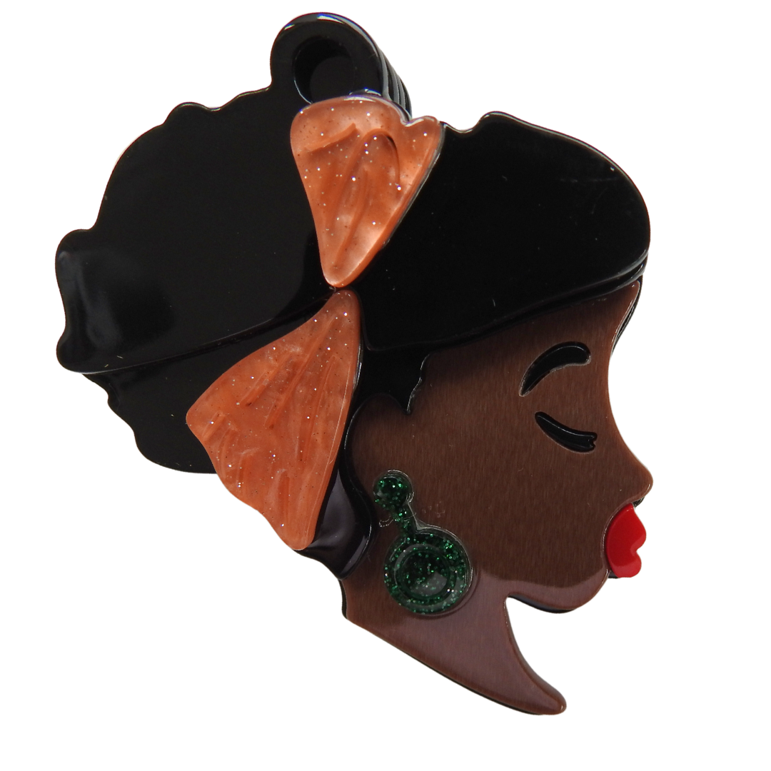 African lady's face brooch