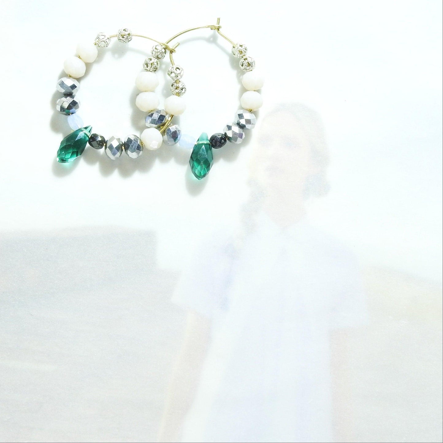 Beaded hoop earrings dangle with faceted shiny pink and grey beads and two cute dangly dark green glass teardrops. 30 mm | 1.5''