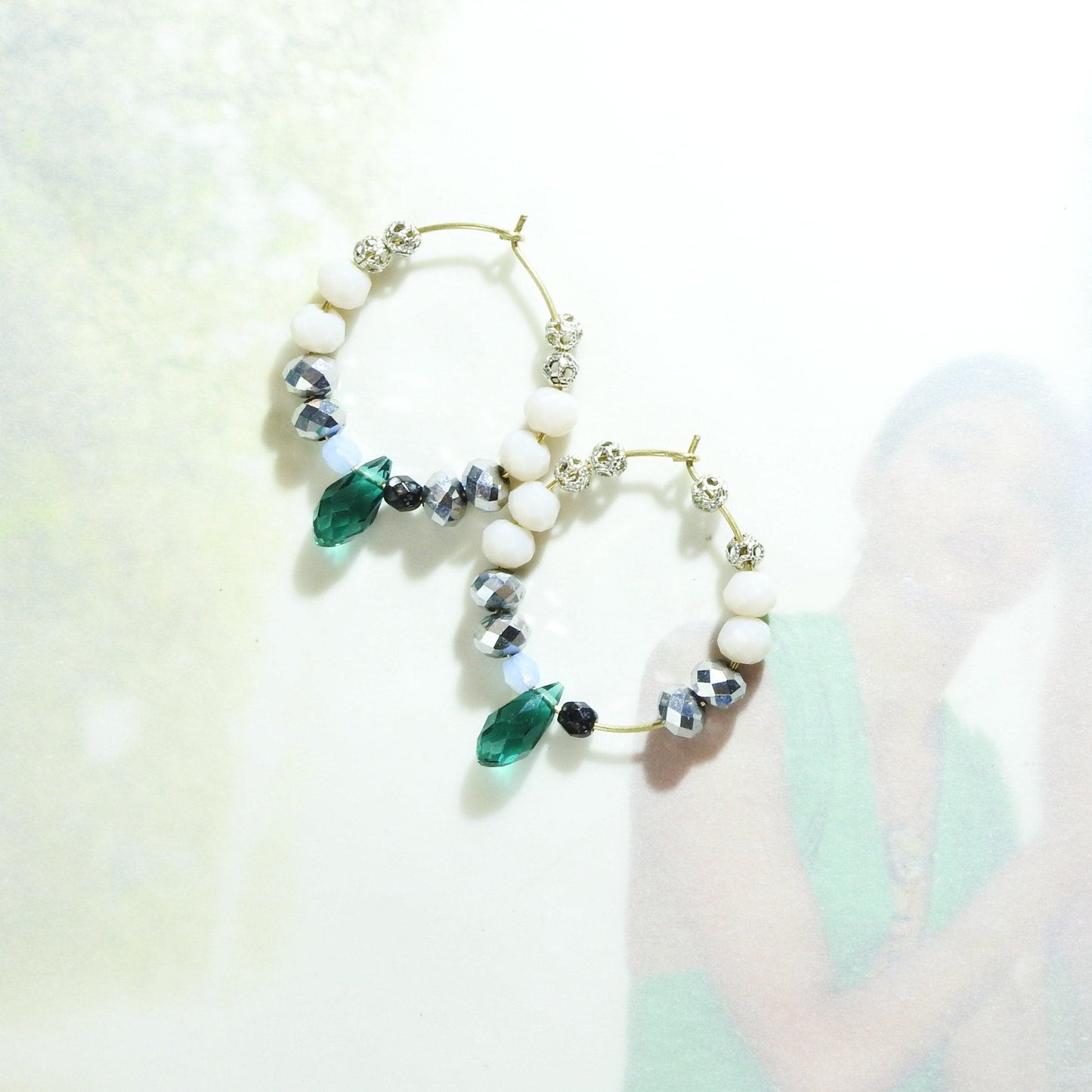 Beaded hoop earrings dangle with faceted shiny pink and grey beads and two cute dangly dark green glass teardrops. 30 mm | 1.5''