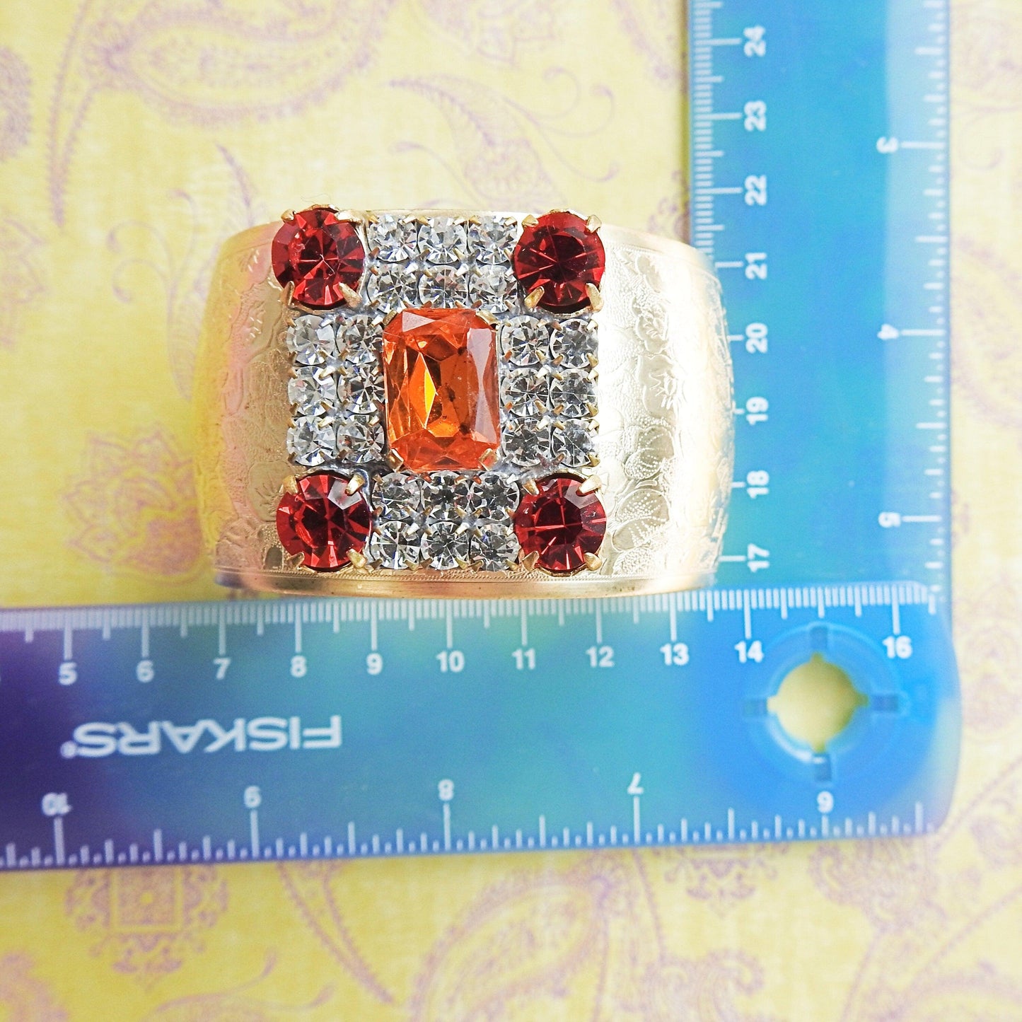 Crystal wide gold bracelet for ladies, made from a large sparkly orange geometric sparkly Czech glass button, anthro inspired bangle jewelry