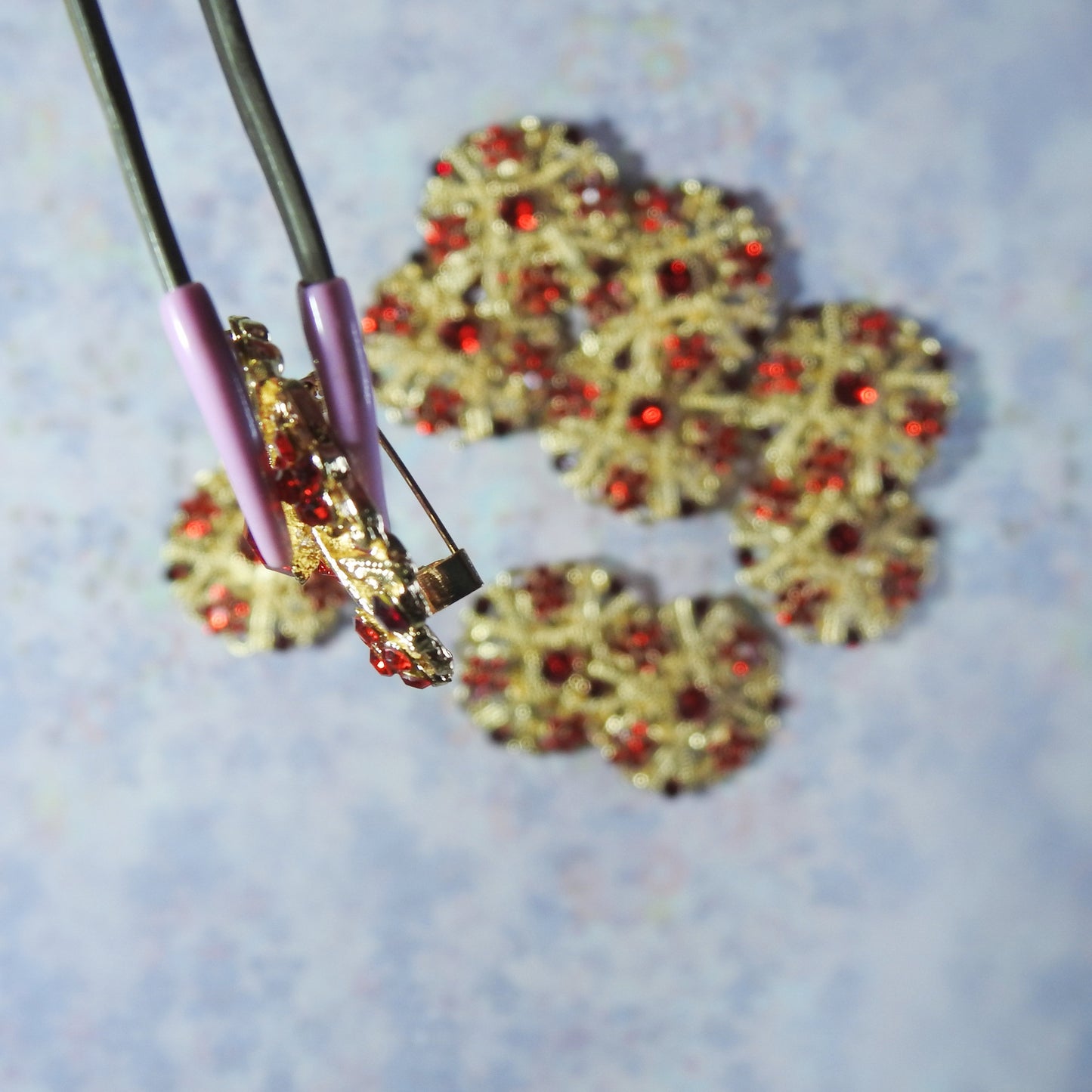 Lovely Set of 10 Red and Gold Brooches