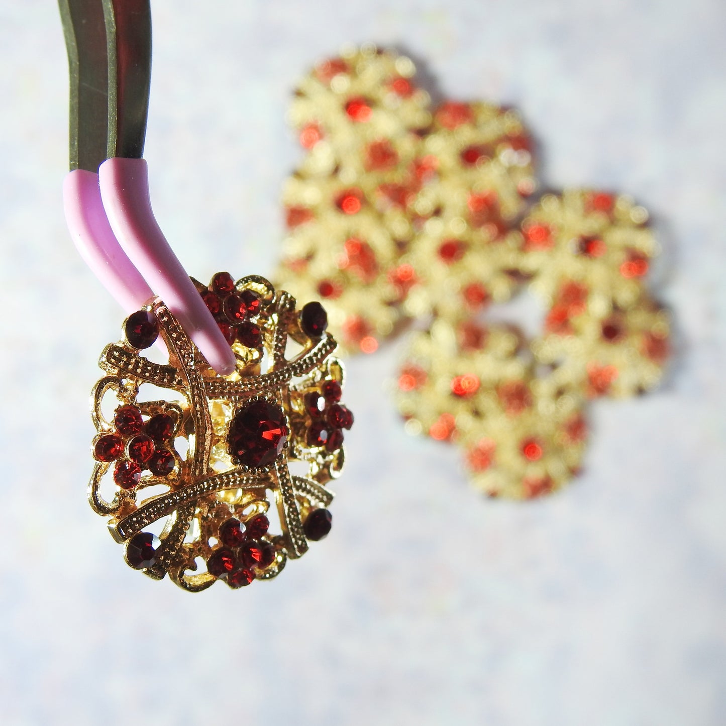 Lovely Set of 10 Red and Gold Brooches