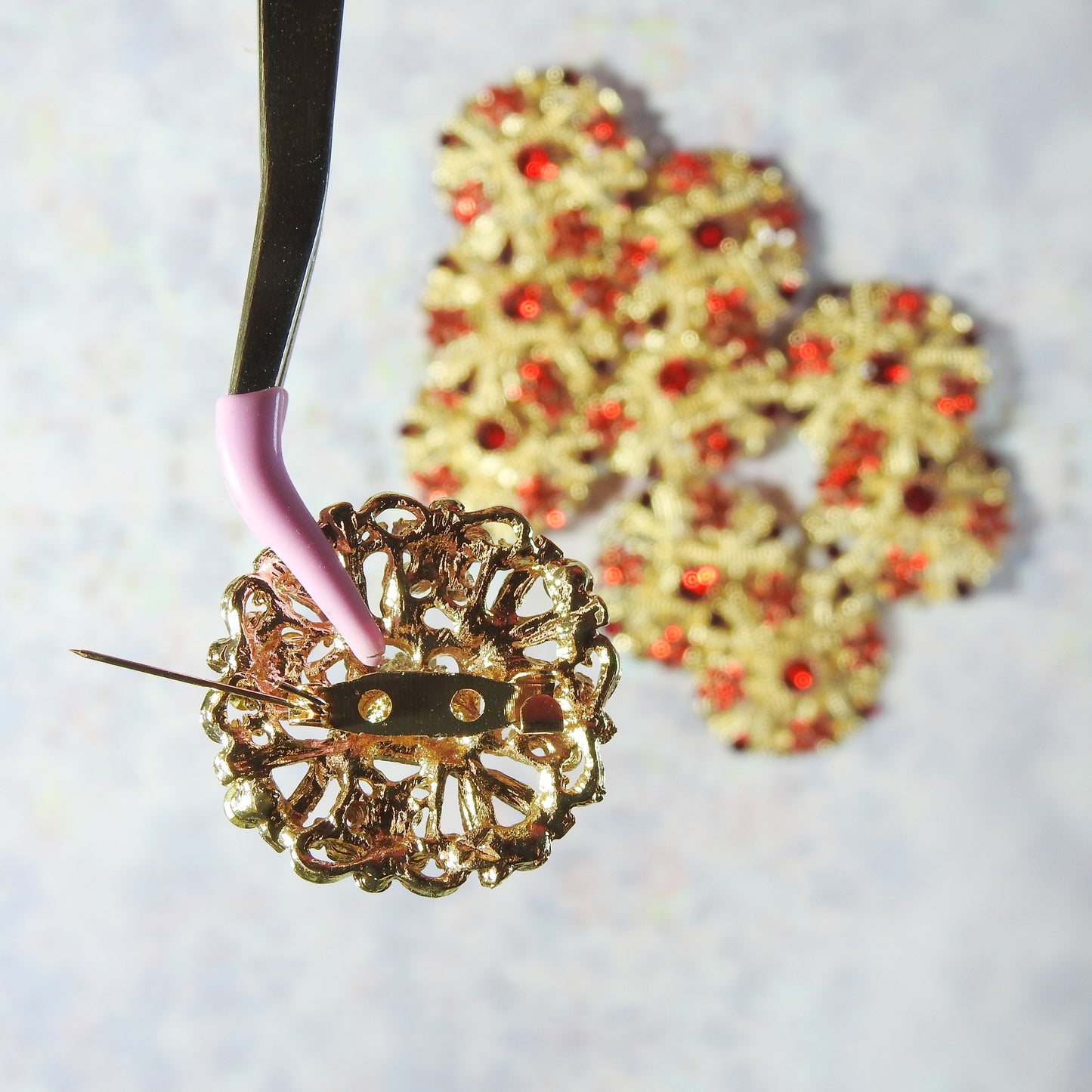 Lovely Set of 10 Red and Gold Brooches