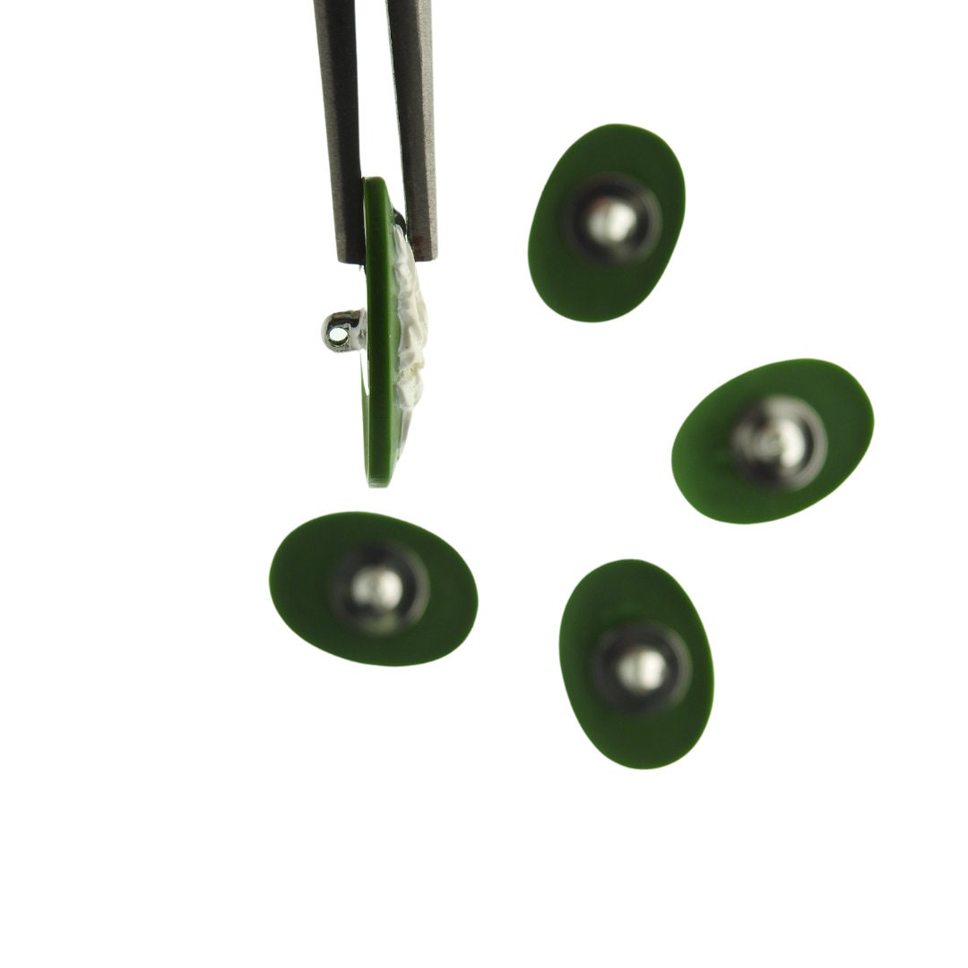 Dark green cameo buttons with white rose detail