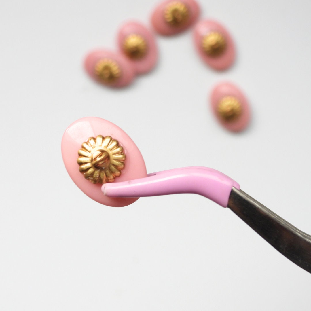 Light pink glass buttons