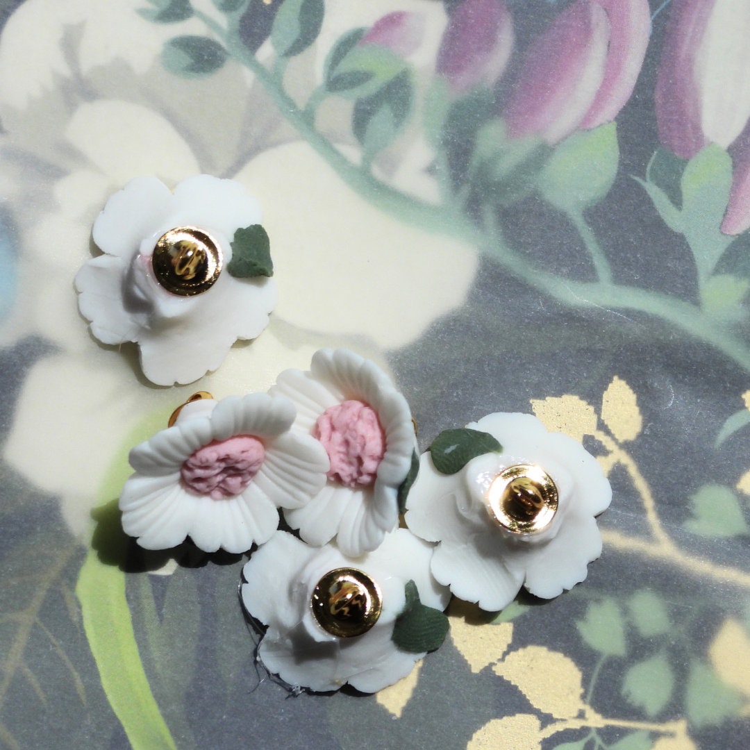 Pink white ceramic buttons