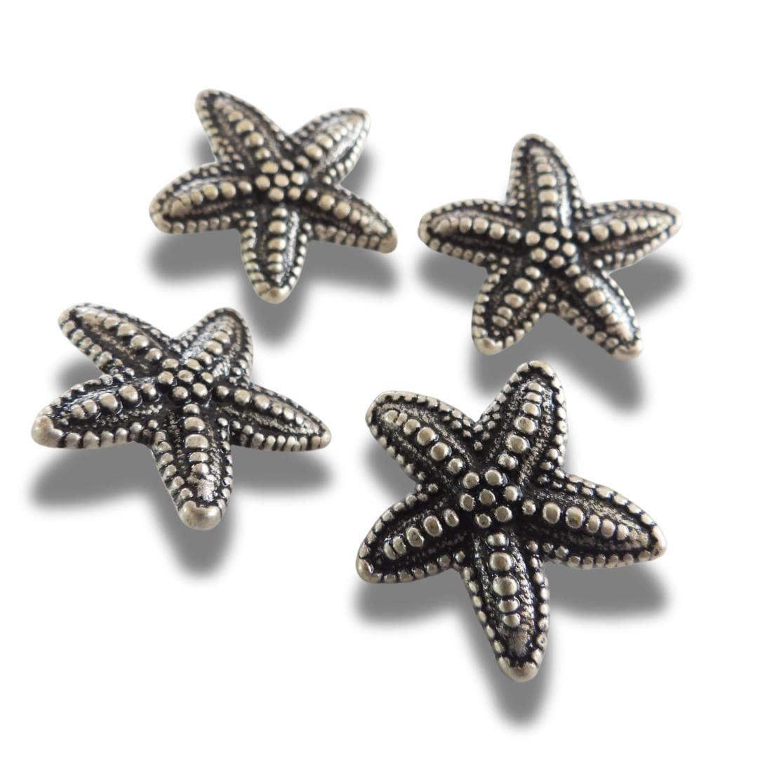 Set of 4 starfish-shaped 20mm metal buttons with a textured finish and shank back - for clothes, coats, crafts, and nautical-themed projects