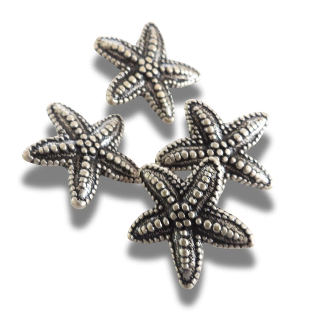 Set of 4 starfish-shaped 20mm metal buttons with a textured finish and shank back - for clothes, coats, crafts, and nautical-themed projects
