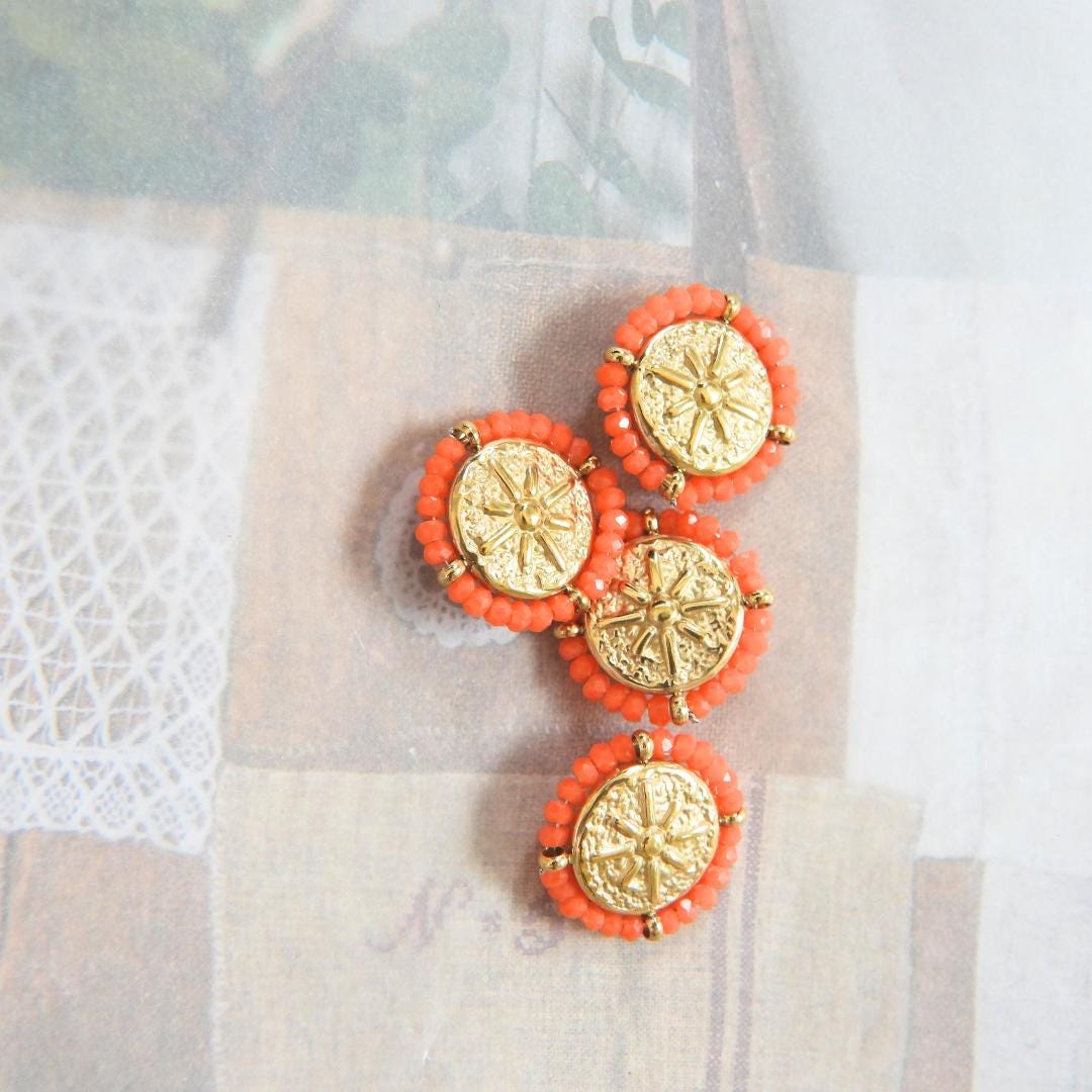 Set of 4 gold-toned 18mm fancy buttons for decorating. Roman medallion-inspired design, rosette motif, surrounded by orange glass seed beads