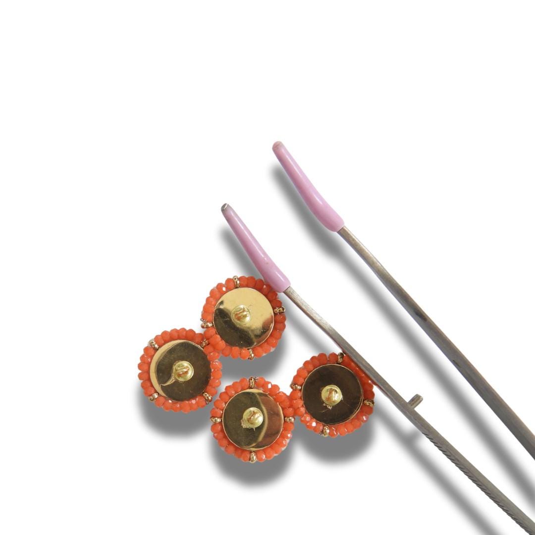 Set of 4 gold-toned 18mm fancy buttons for decorating. Roman medallion-inspired design, rosette motif, surrounded by orange glass seed beads