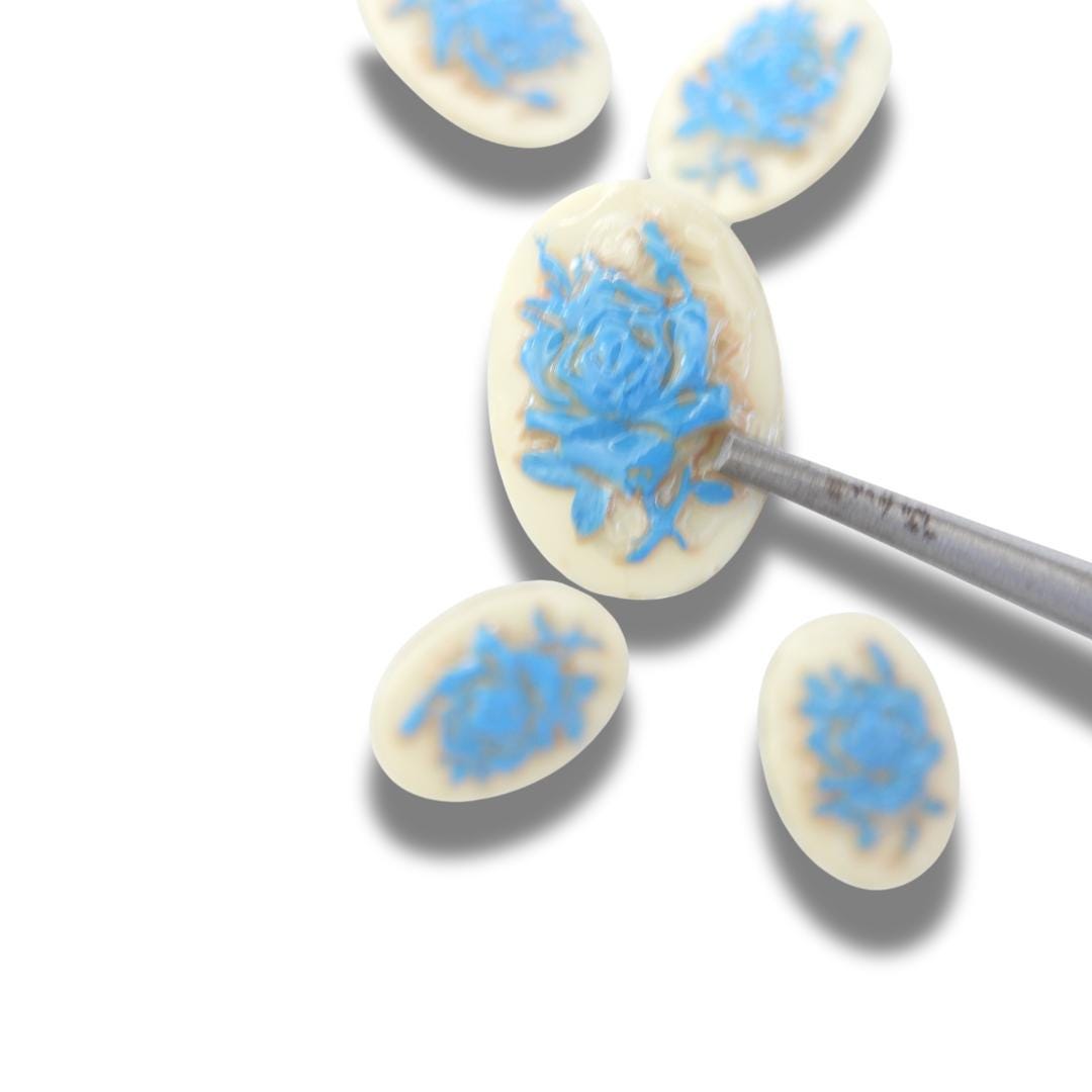 Vintage-inspired set of 5 oval cameo buttons with floral design, perfect for sewing, crafts, and jewelry making. Gift-ready for creatives!