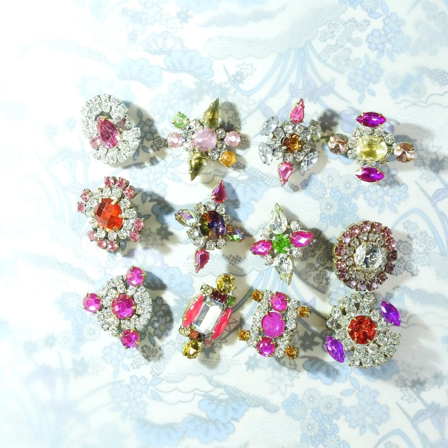 Pink rhinestone glass buttons with shank for jewelry; sewing on knitted garments, crochet projects, leather belts, fancy dresses. Lot of 12