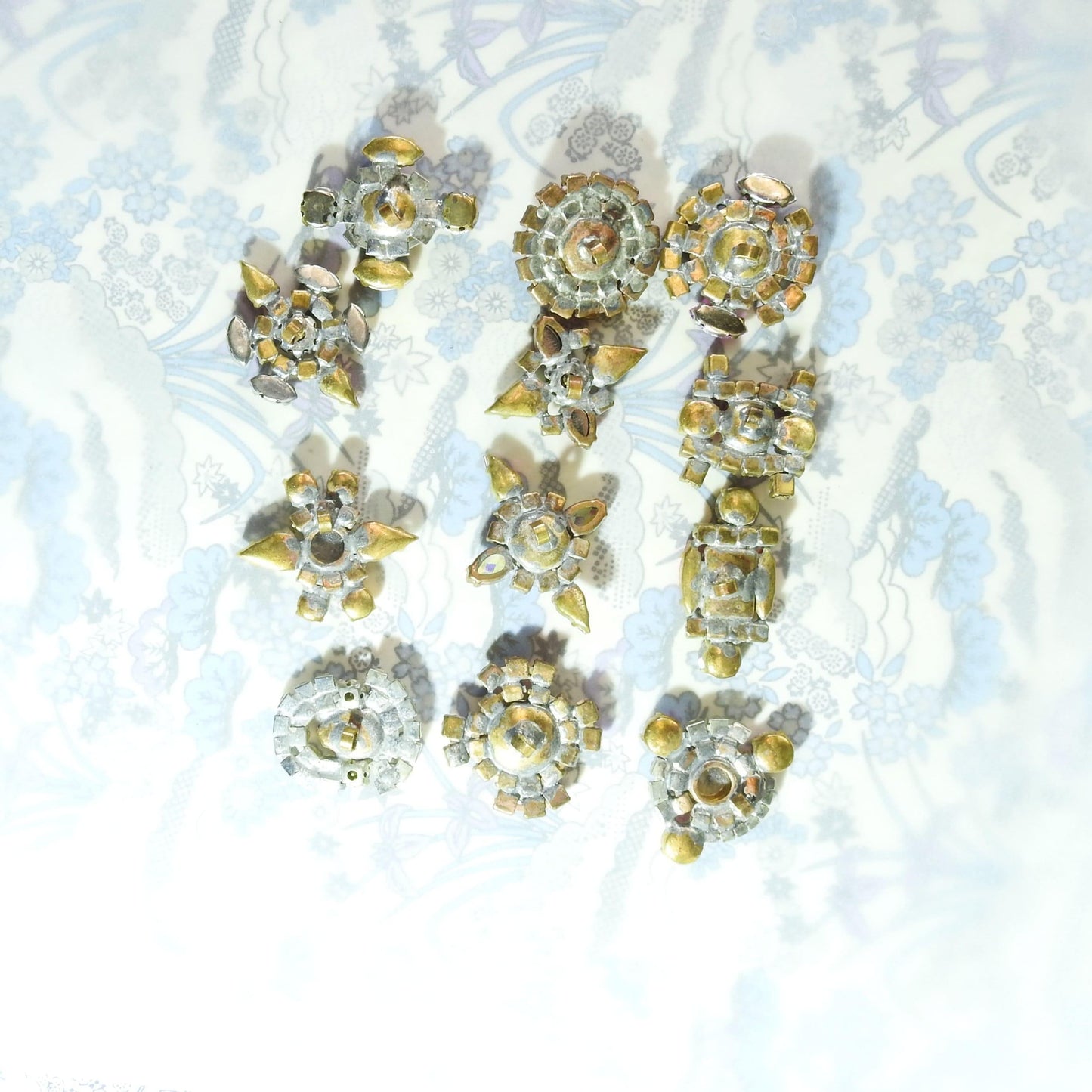 Pink rhinestone glass buttons with shank for jewelry; sewing on knitted garments, crochet projects, leather belts, fancy dresses. Lot of 12