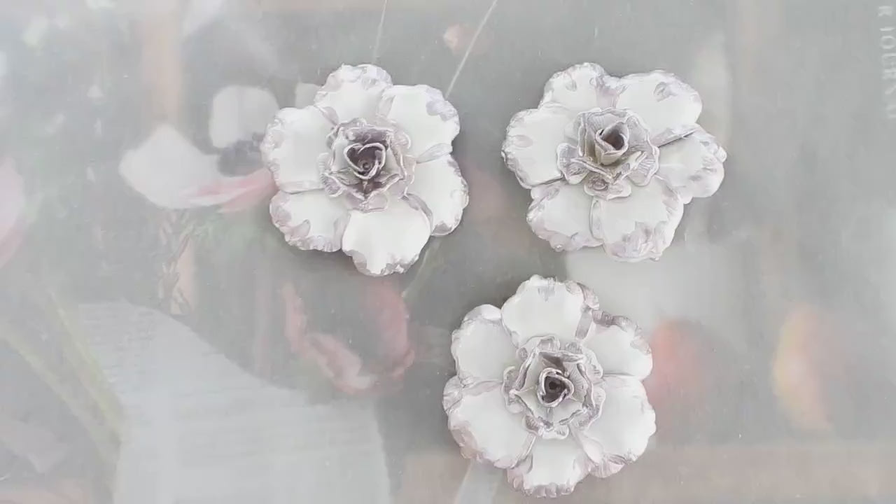 Hand-painted purple and white flower buttons for decorating hats