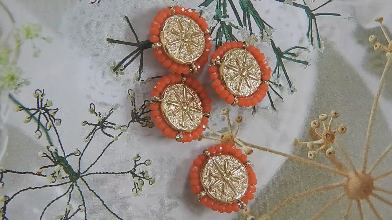 Set of 4 gold-toned 18mm fancy buttons for decorating. Roman medallion-inspired design