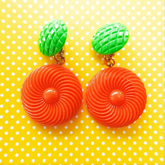 Neon orange dangle clip earrings for women. Cool jewelry gift ideas under 25 dollars. 1970s 1980s-inspired funky style. Ready to ship