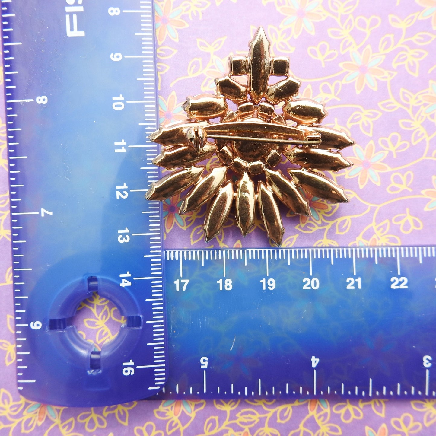 Vintage aurora borealis brooch