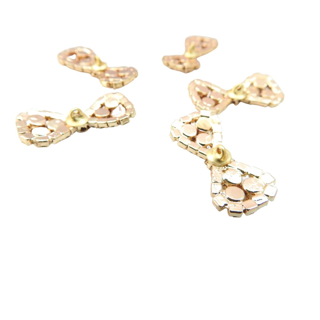 Sparkly bow-shaped buttons