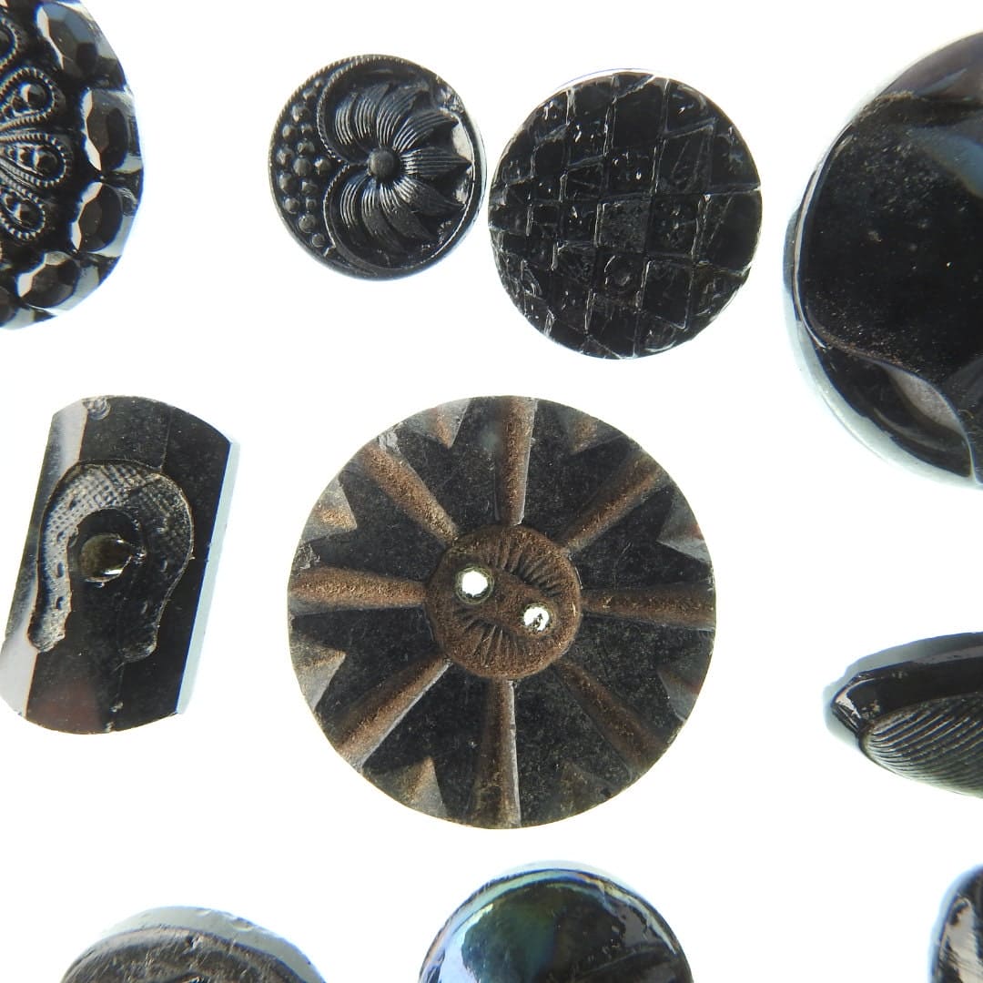 Black antique Czech glass buttons lot, with shine and luster, for sewing on clothing and jewelry. Assortment of 16 vintage buttons. 1930s