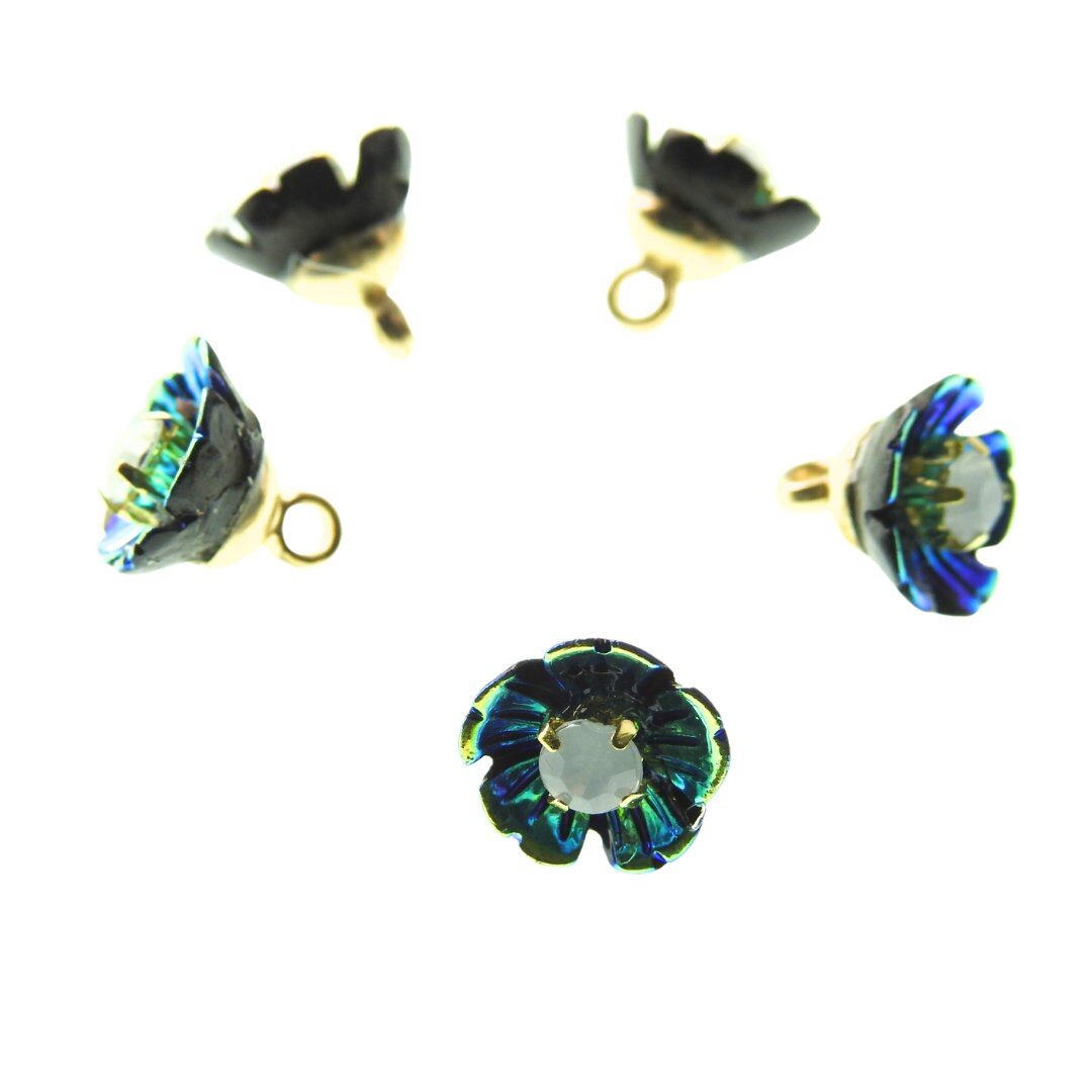 Small blue fancy flower-shaped buttons for sewing and crafts. 10 mm