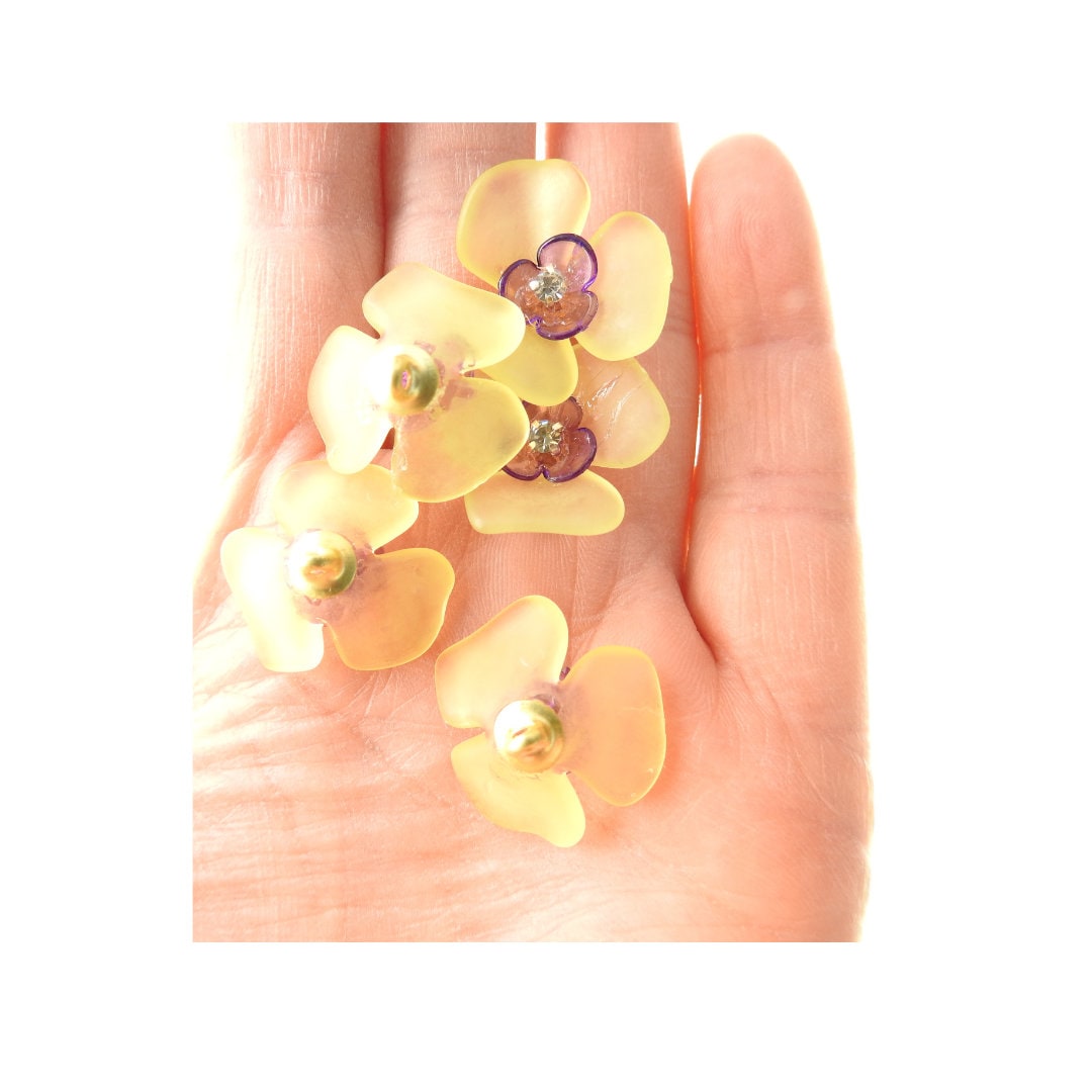 Flower-shaped buttons for clothes. Purple and yellow, with a shank. To sew on cardigans, dresses, and embellished lace. Sewing gifts ideas