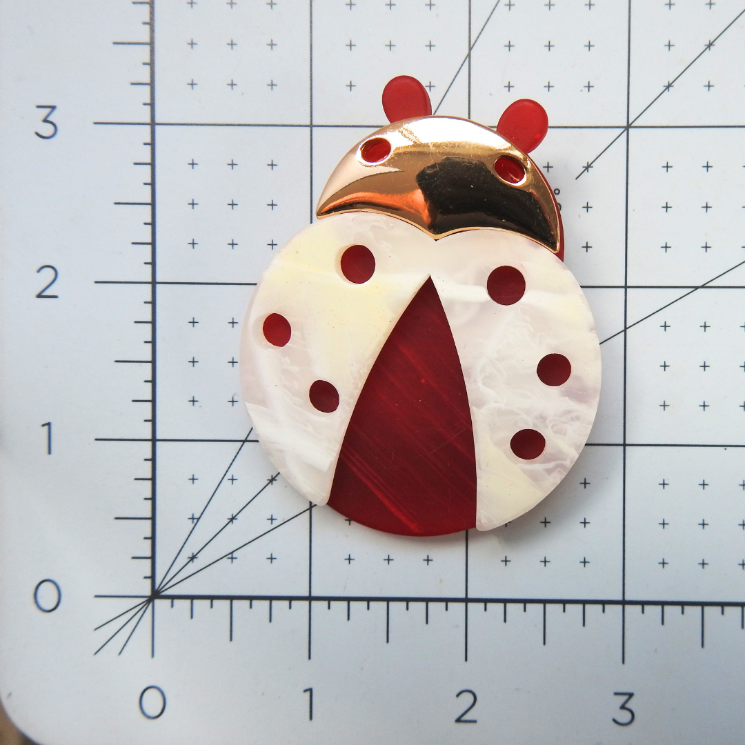 Oversized ladybug brooch