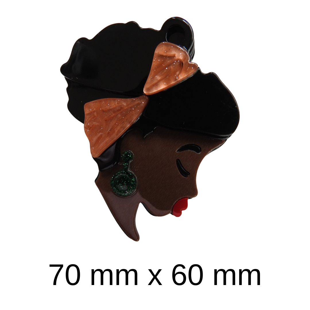 African lady's face brooch