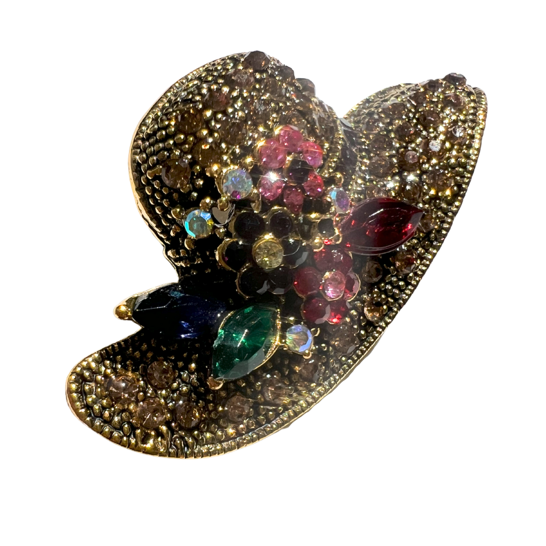 Small rhinestone brooch shaped like a hat