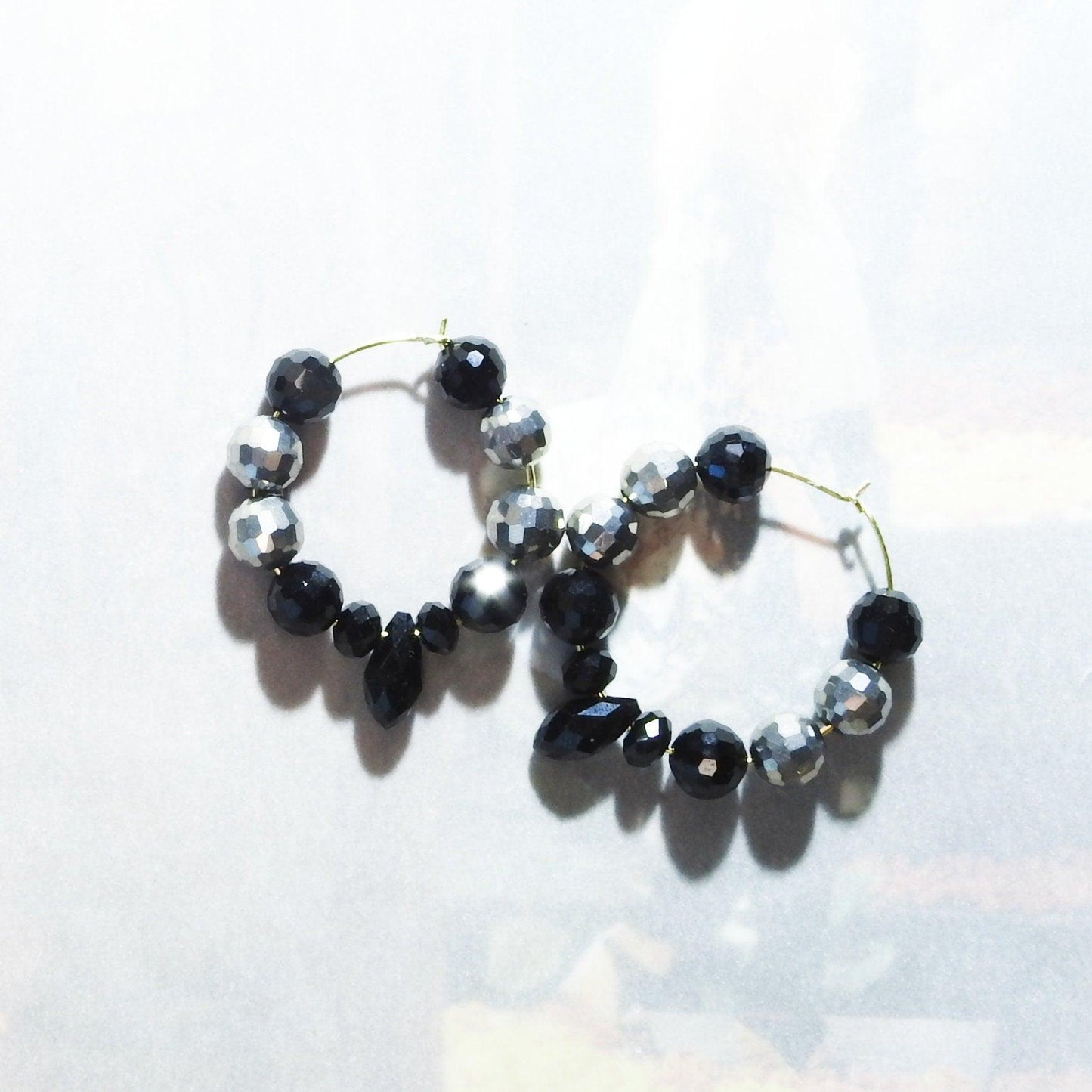 black hoop earrings female