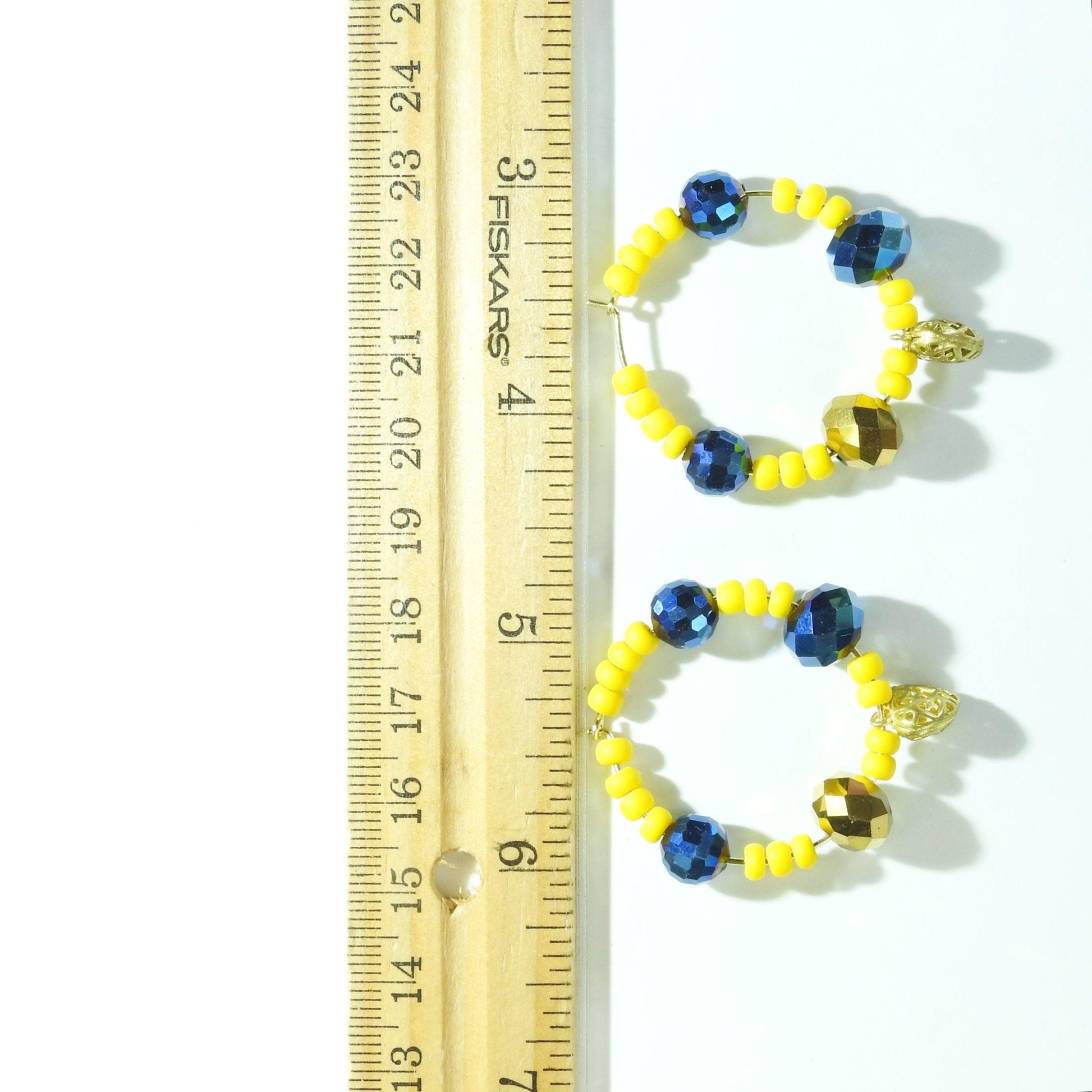 Electric blue earrings hoops with sunny yellow and indigo flashy beads. Eye-catching, boho, dangly with vibrant colors. Handmade, 30 mm