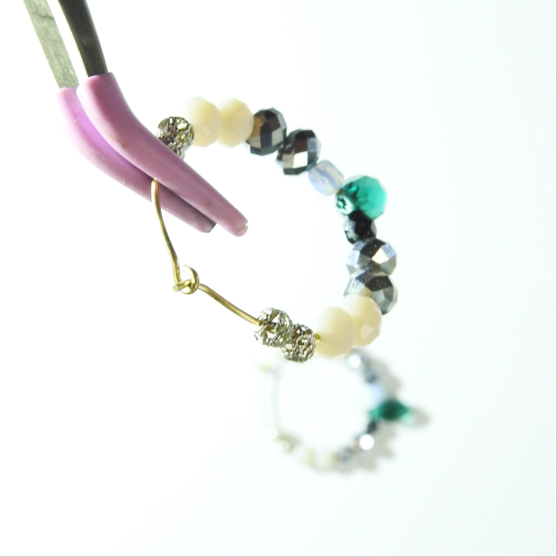 Beaded hoop earrings dangle with faceted shiny pink and grey beads and two cute dangly dark green glass teardrops. 30 mm | 1.5''