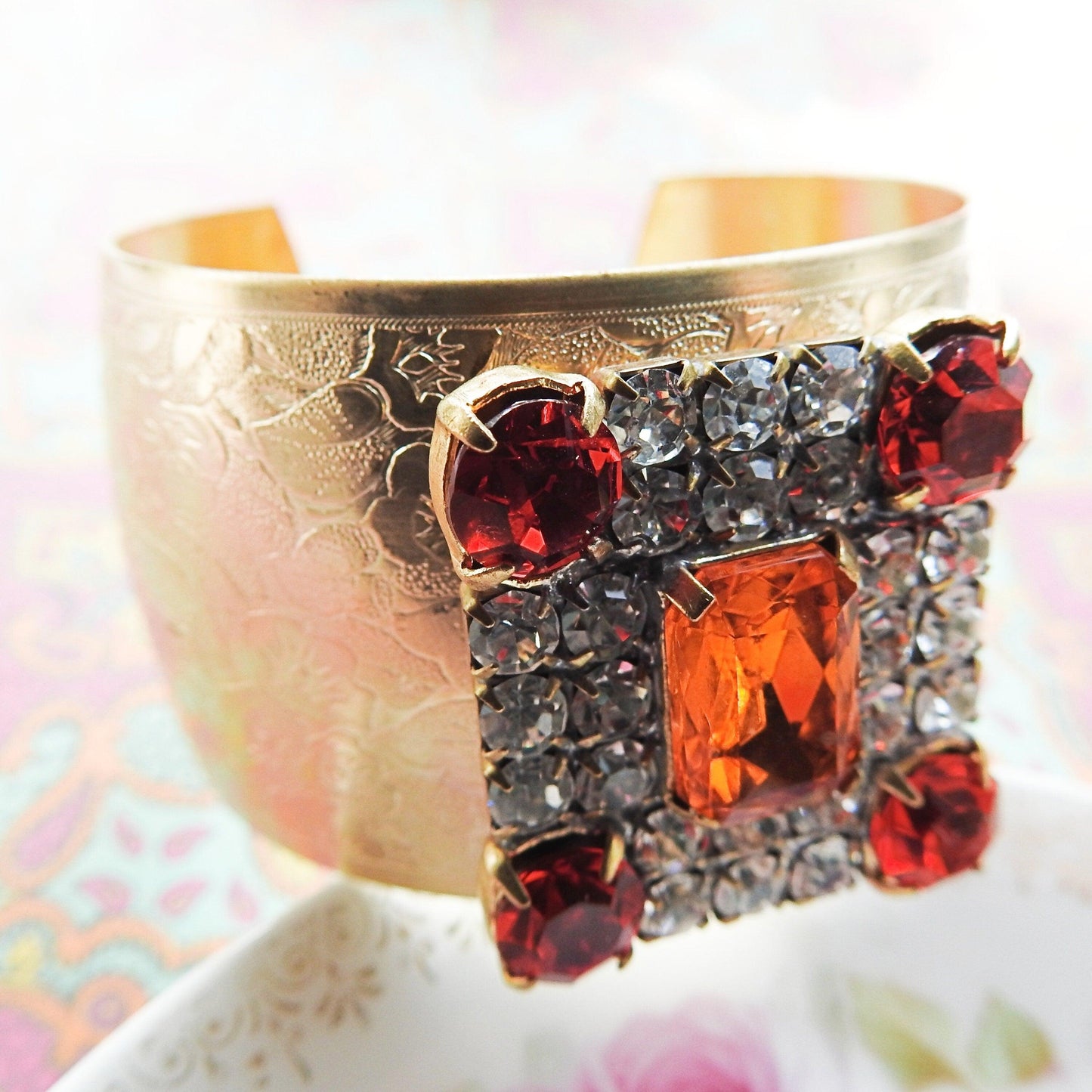 Crystal wide gold bracelet for ladies, made from a large sparkly orange geometric sparkly Czech glass button, anthro inspired bangle jewelry