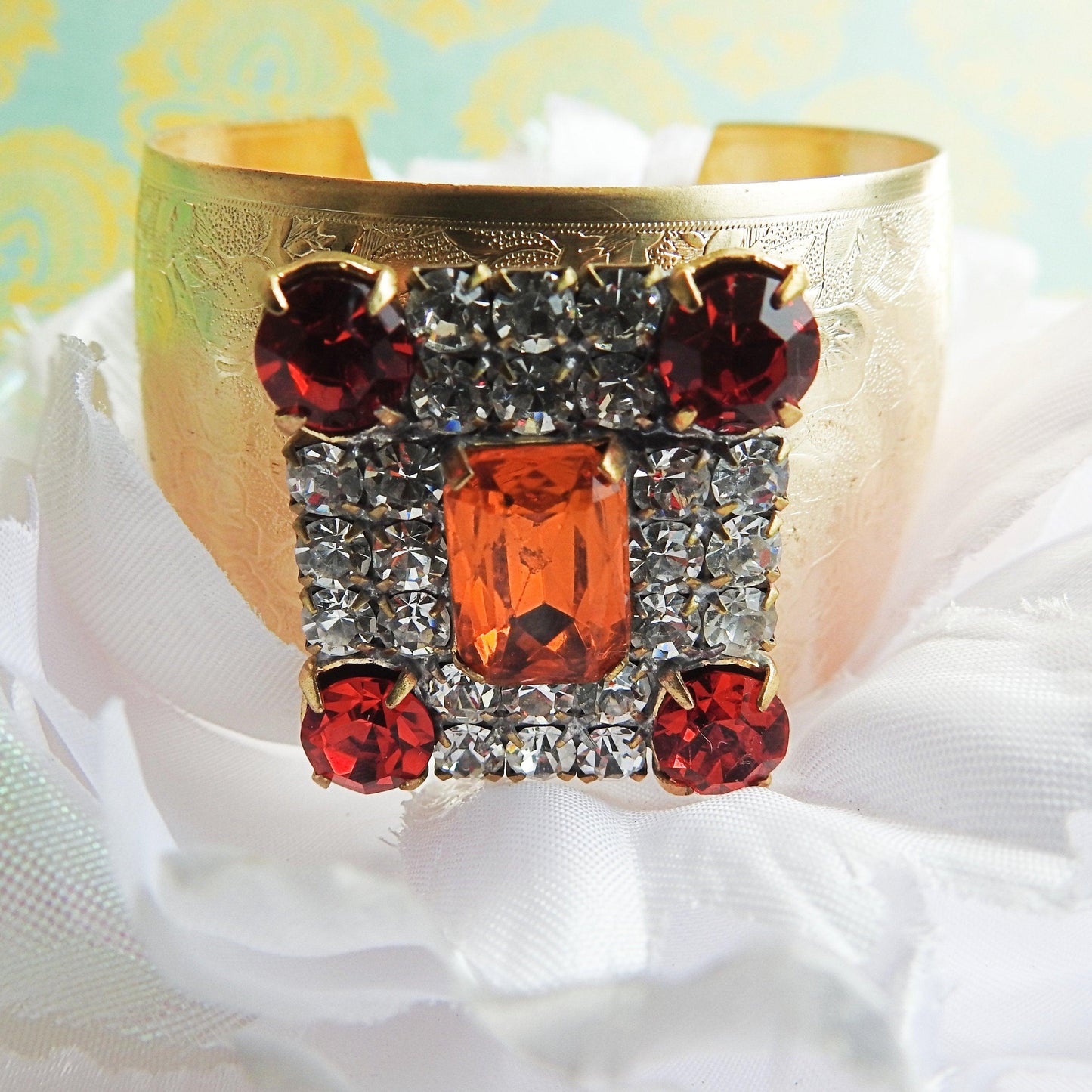 Crystal wide gold bracelet for ladies, made from a large sparkly orange geometric sparkly Czech glass button, anthro inspired bangle jewelry