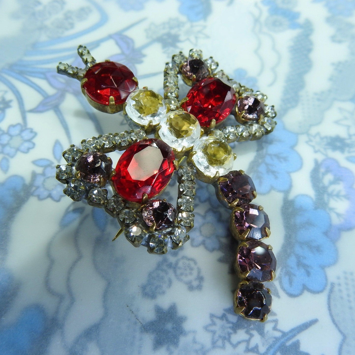 diamond-studded brooches