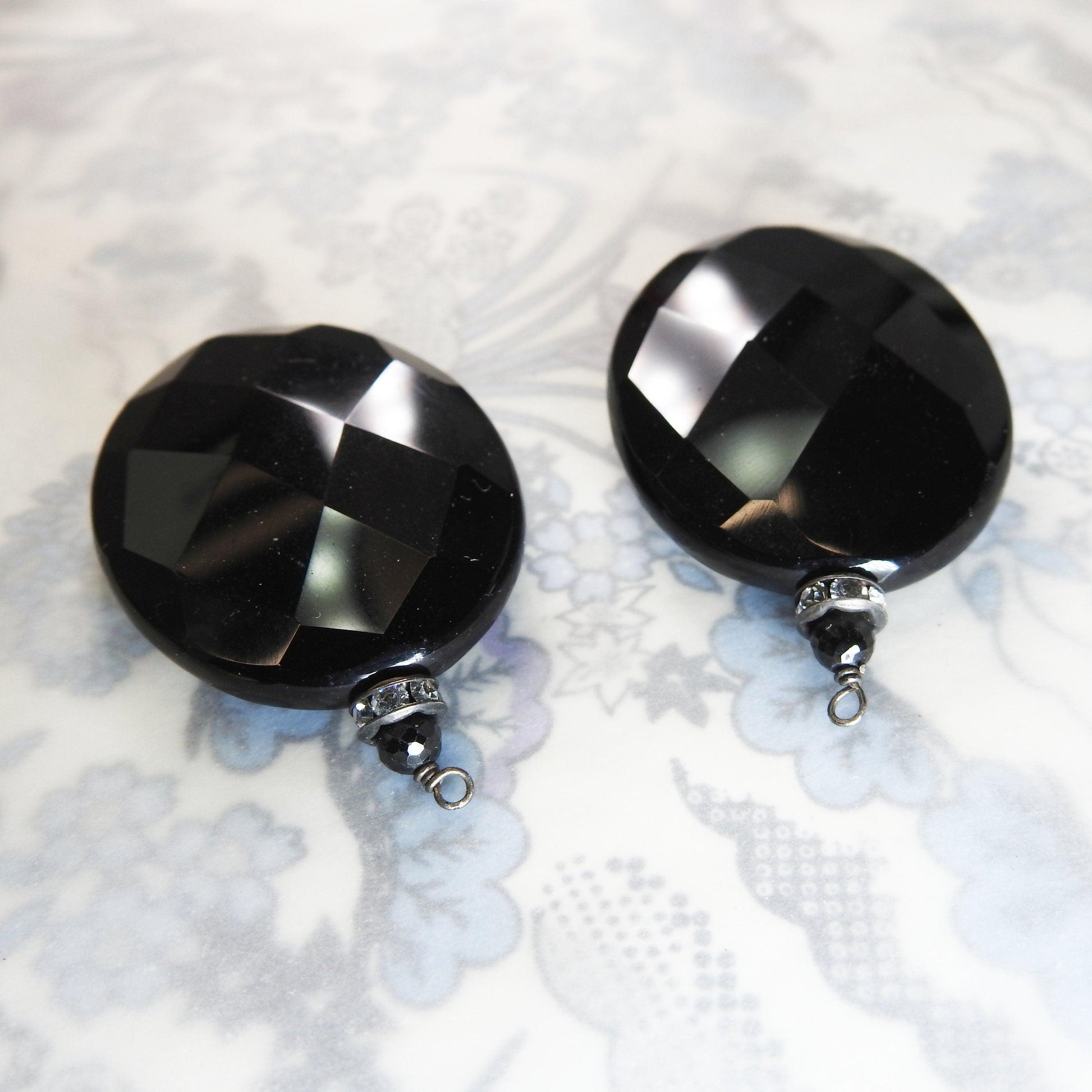 Faceted glass pendants components for making earrings. Jet black chandelier or vintage pendulous oval shaped focal teardrop adornment