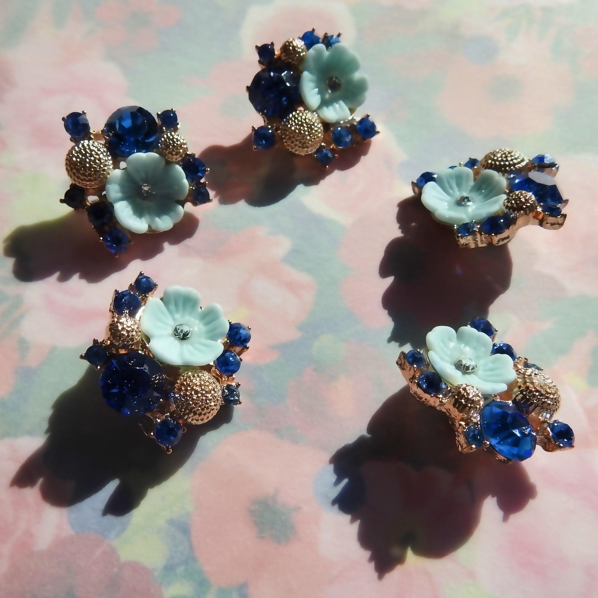 blue buttons with flowers