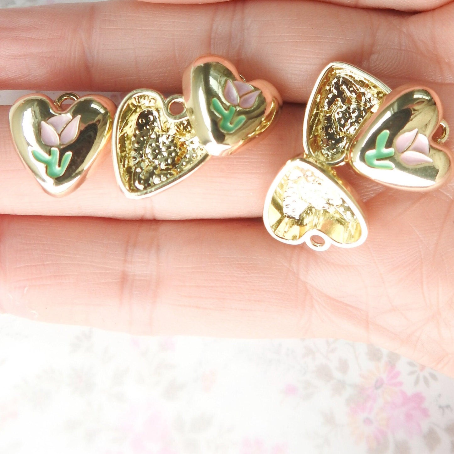 10 Heart shaped charms for bracelet, necklace, earrings, with a pink tulip flower on them. Cute jewelry-making supplies for pendants