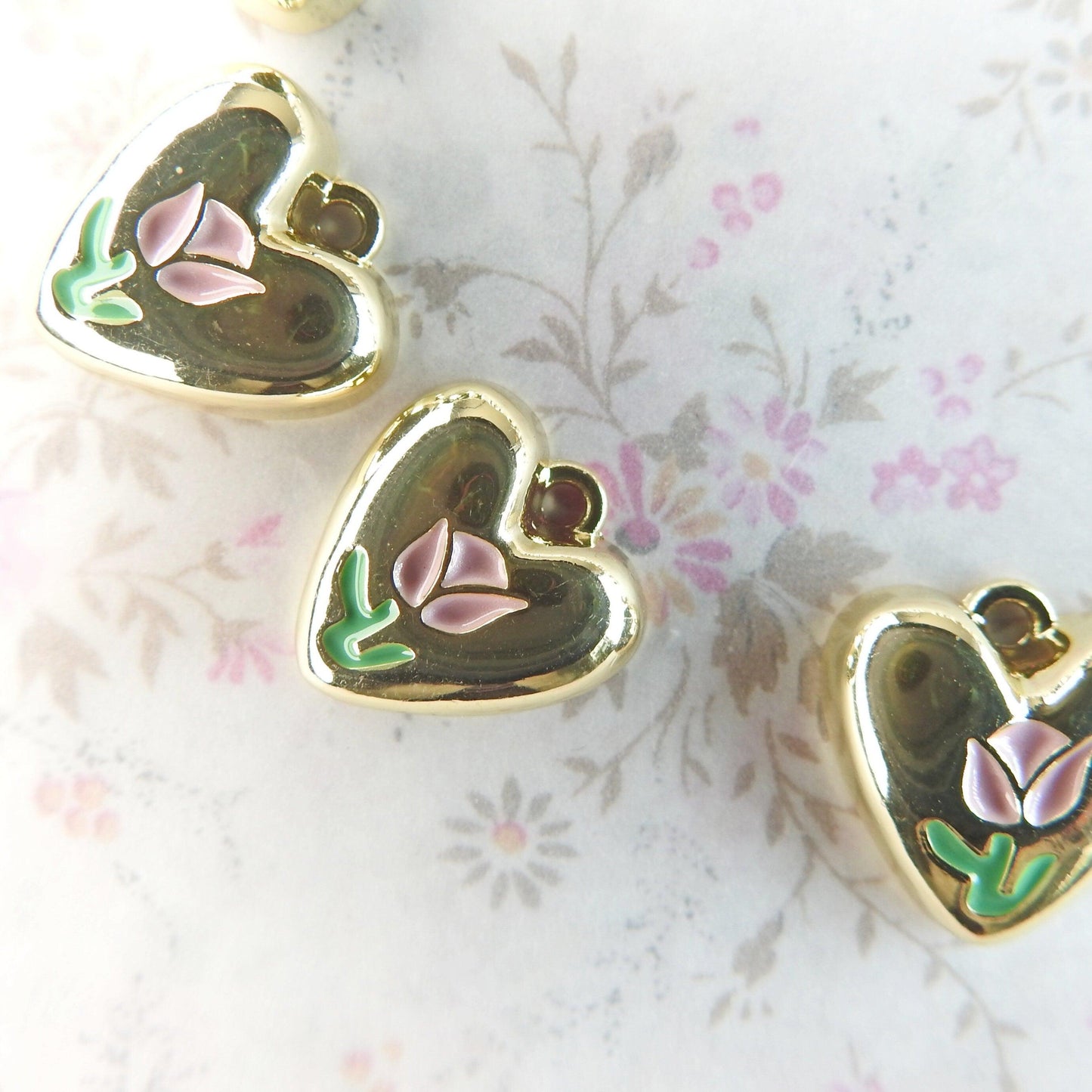 10 Heart shaped charms for bracelet, necklace, earrings, with a pink tulip flower on them. Cute jewelry-making supplies for pendants