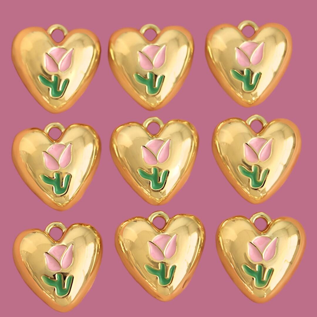 10 Heart shaped charms for bracelet, necklace, earrings, with a pink tulip flower on them. Cute jewelry-making supplies for pendants