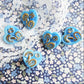 Lot of 5 heart buttons with shank, with four-leaf clover and horseshoe on them, blue mushroom buttons for novelty jewelry making and sewing