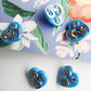 Lot of 5 heart buttons with shank, with four-leaf clover and horseshoe on them, blue mushroom buttons for novelty jewelry making and sewing