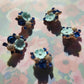 Blue flower-shaped decorative buttons