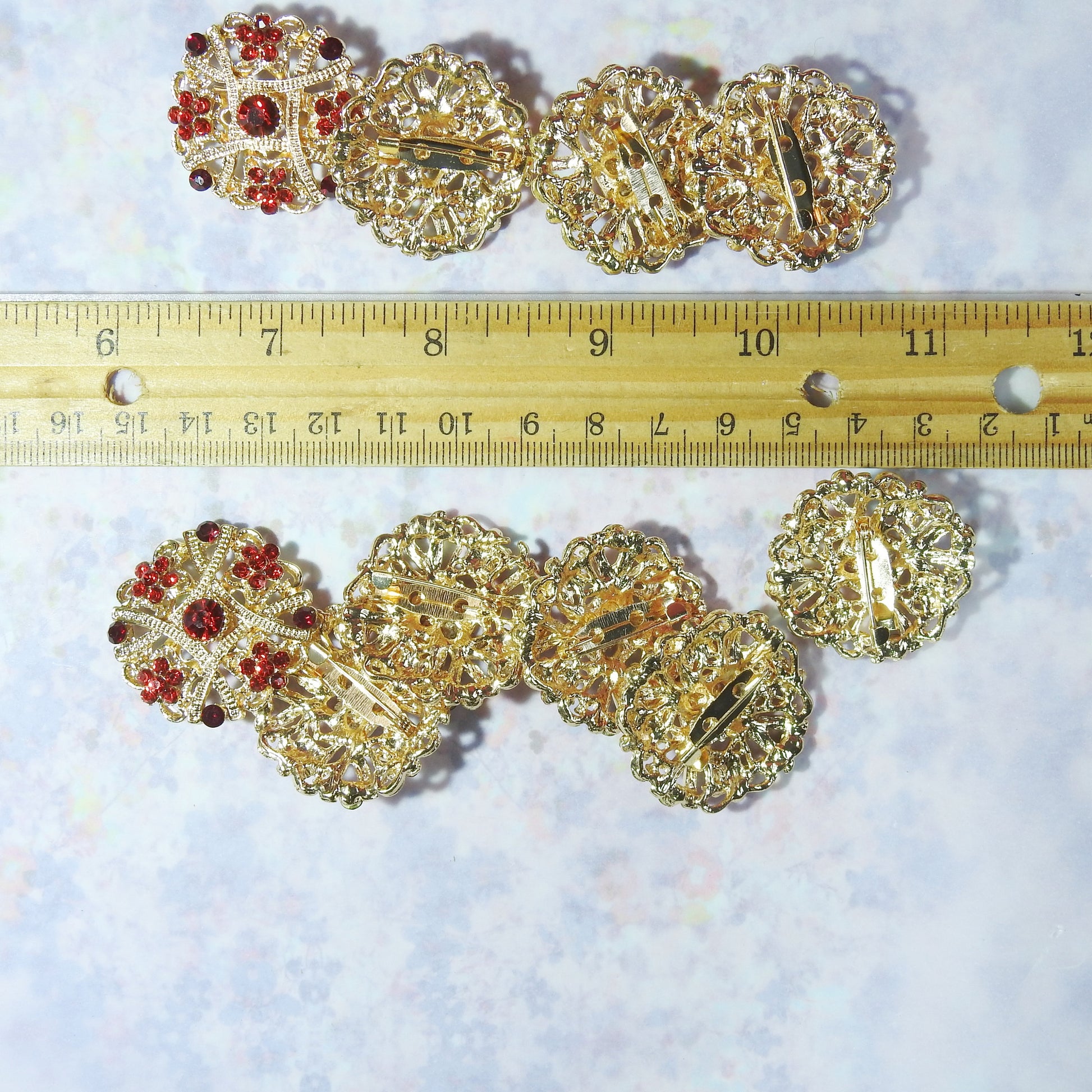 Lovely Set of 10 Red and Gold Brooches