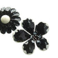 Black vintage enamel flower brooches