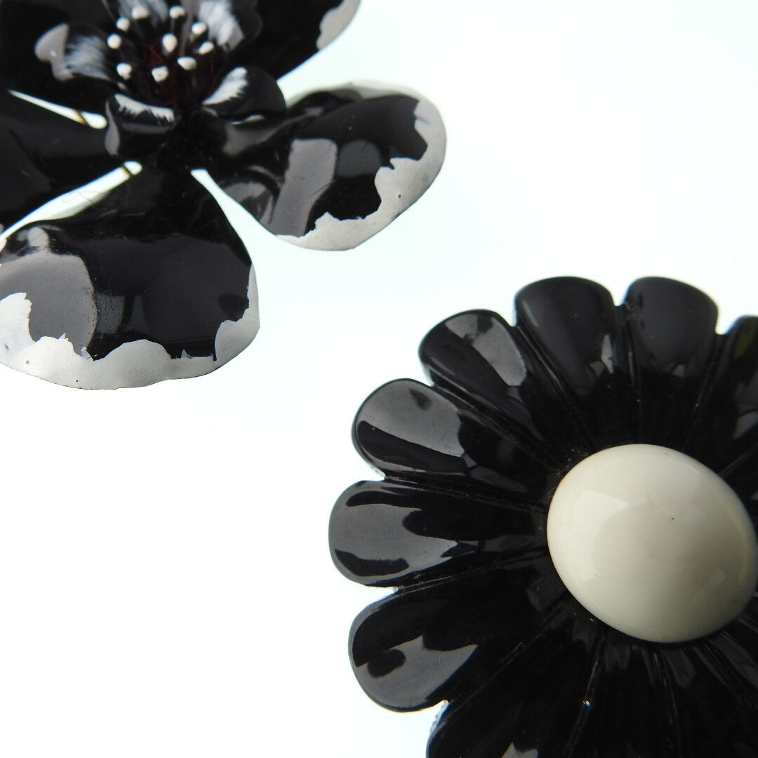 Black vintage enamel flower brooches