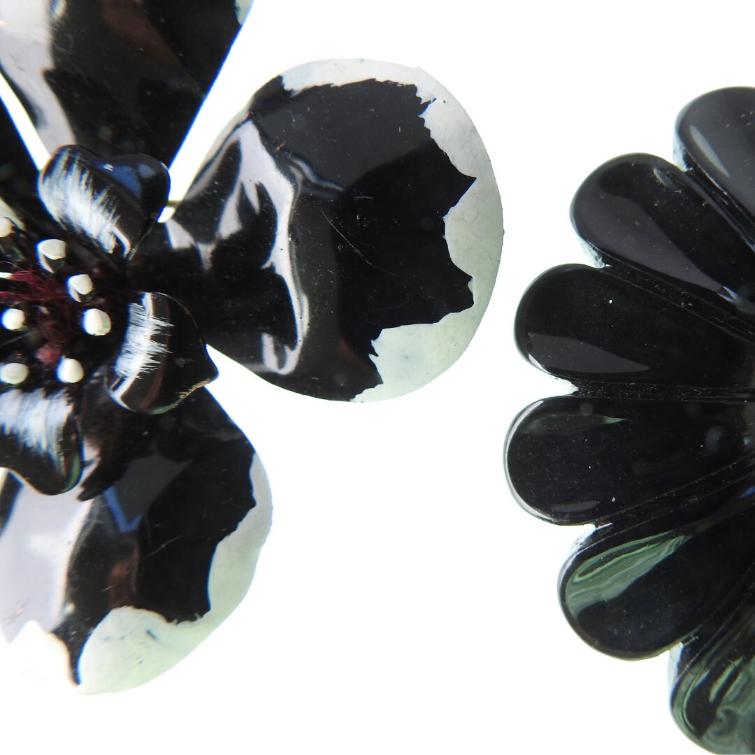 Black vintage enamel flower brooches