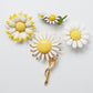 Vintage enamel flower brooches, daisy-shaped, set of 4. Perfect accessories for bridal bouquet, wedding decoration and more