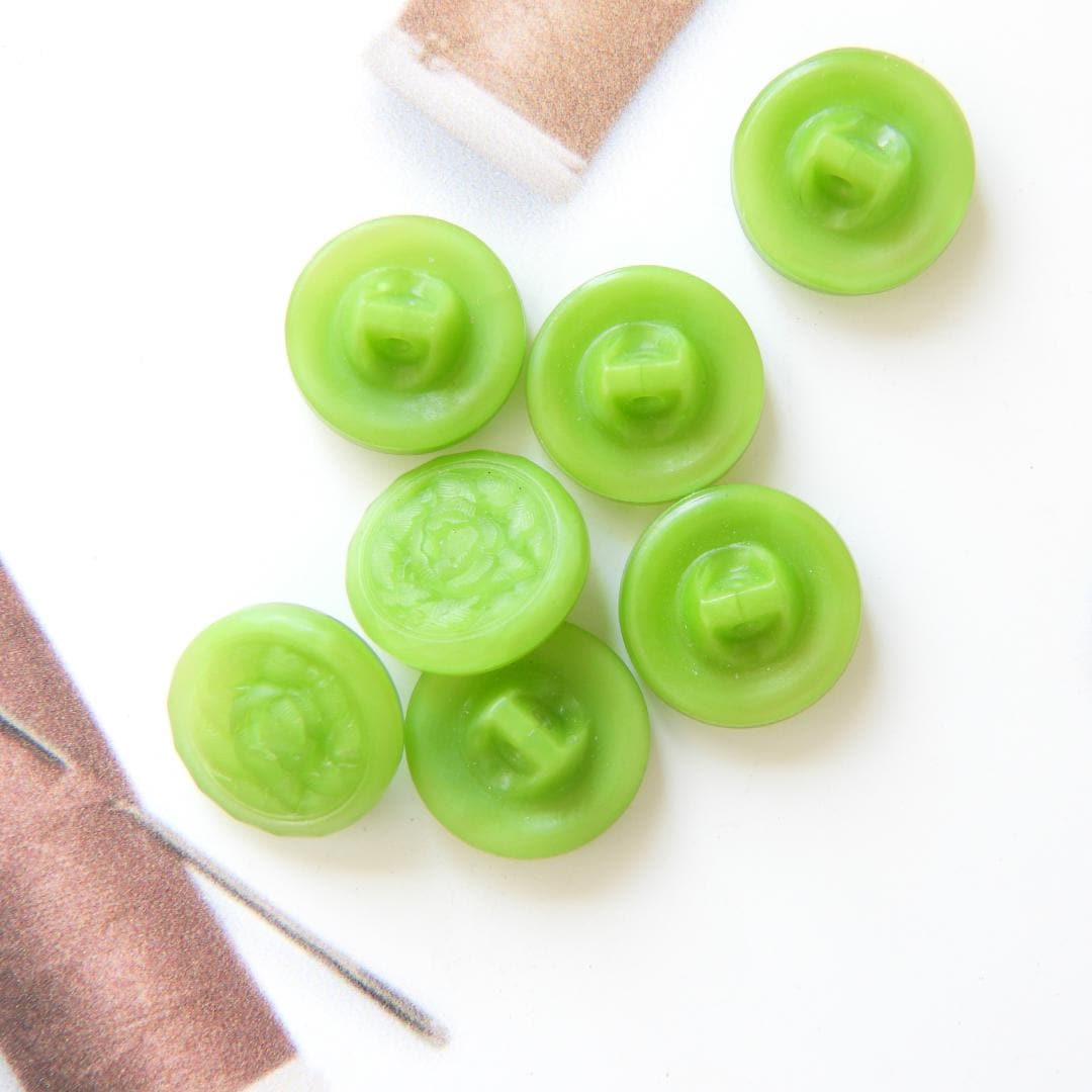 Vintage green glass buttons for sewing and crafting. Set of 5