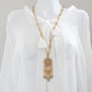 Vintage long gold pendant necklace with glass rhinestone