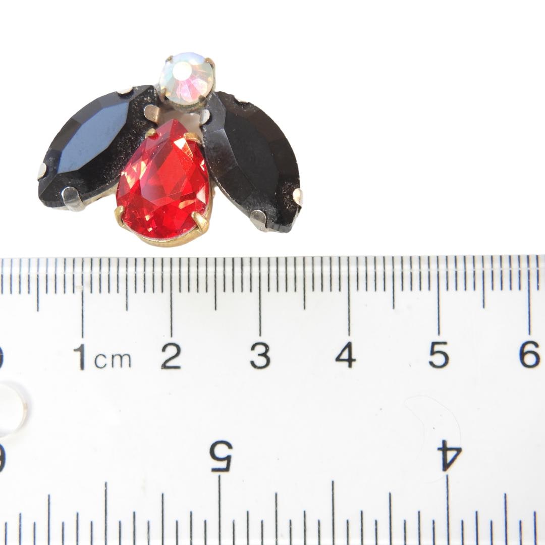 Cute bee button for decorating and sewing on coat, hat, or bag. Red, black, fancy and decorative antique glass embellishment to sew